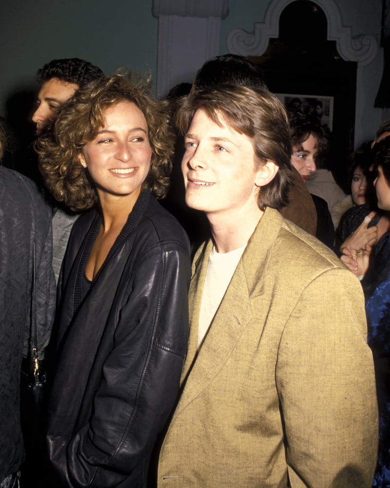 Tracy Pollan’s husband, Michael J. Fox, and her best friend, Jennifer Grey, are photographed together at the 1986 premiere of the film ‘Pretty in Pink.‘