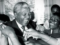 articles/2013/12/05/six-defining-moments-from-nelson-mandela-s-life-video/131205-mandela-reactions_nxoglh