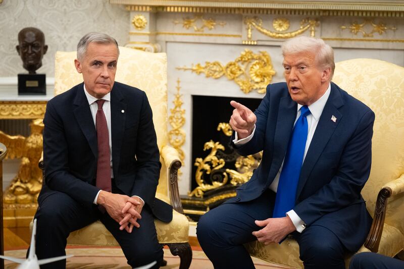 WASHINGTON,DC - U.S. President Donald Trump met with Canadian Prime Minister Mark Carney in the Oval Office of the White House, Oct. 7, 2025, in Washington.(Photo by Sarah L. Voisin/The Washington Post via Getty Images)