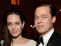 HOLLYWOOD, CA - NOVEMBER 05: Writer-director-producer-actress Angelina Jolie Pitt (L) and actor-producer Brad Pitt attend the after party for the opening night gala premiere of Universal Pictures' "By the Sea" during AFI FEST 2015 presented by Audi at TCL Chinese 6 Theatres on November 5, 2015 in Hollywood, California. (Photo by Michael Kovac/Getty Images for AFI)