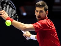 Serbia's Novak Djokovic returns the ball against Italy's Jannik Sinner during the semi-final of the Six Kings Slam exhibition tennis tournament in Riyadh on October 16, 2025. (Photo by Fayez NURELDINE / AFP) (Photo by FAYEZ NURELDINE/AFP via Getty Images)