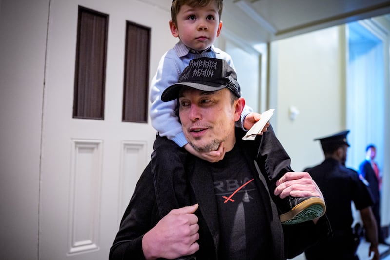 Elon Musk and his son X Æ arrive at the U.S. Capitol Building on May 21, 2025 in Washington, DC.