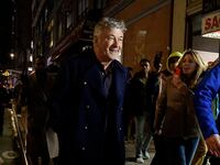 Alec Baldwin is escorted away from a pro-Palestine protest by NYPD officers after clashing with protesters in Midtown Manhattan on December 18, 2023 in New York City.