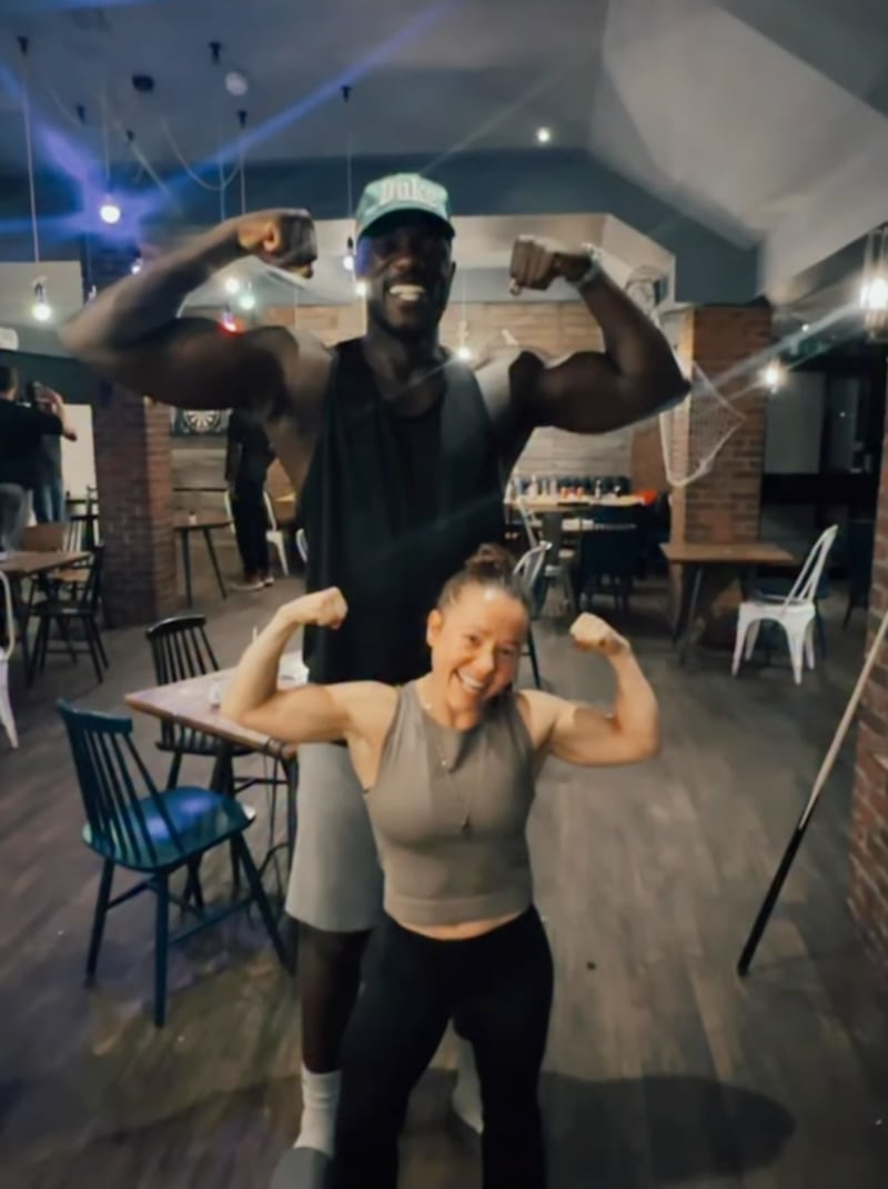 Devyn Dalton poses, displaying her arm muscles in a post celebrating the release of ‘The Odyssey.’