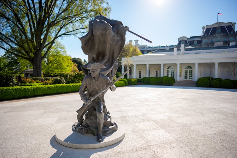 WASHINGTON, DC - APRIL 10: "Freedom's Charge" a Revolutionary War Bronze sculpture depicting the "charge" by Chas Fagan is visible in the Rose Garden after U.S. President Donald Trump departs from the White House on April 10, 2026 in Washington, DC. President Trump is traveling to Charlottesville, Virginia. (Photo by Andrew Harnik/Getty Images)