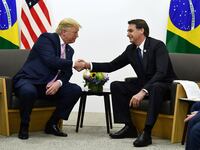 Former Brazilian President Jair Bolsonaro meets with US President-elect Donald Trump during a bilateral meeting on the sidelines of the G20 Summit in Osaka on June 28, 2019.