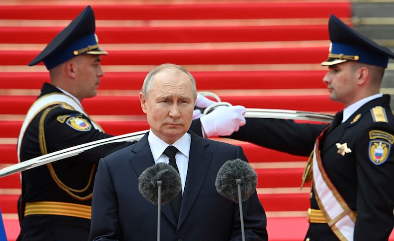 A picture of Russian President Vladimir Putin addressing Russian troops in Cathedral Square in Moscow