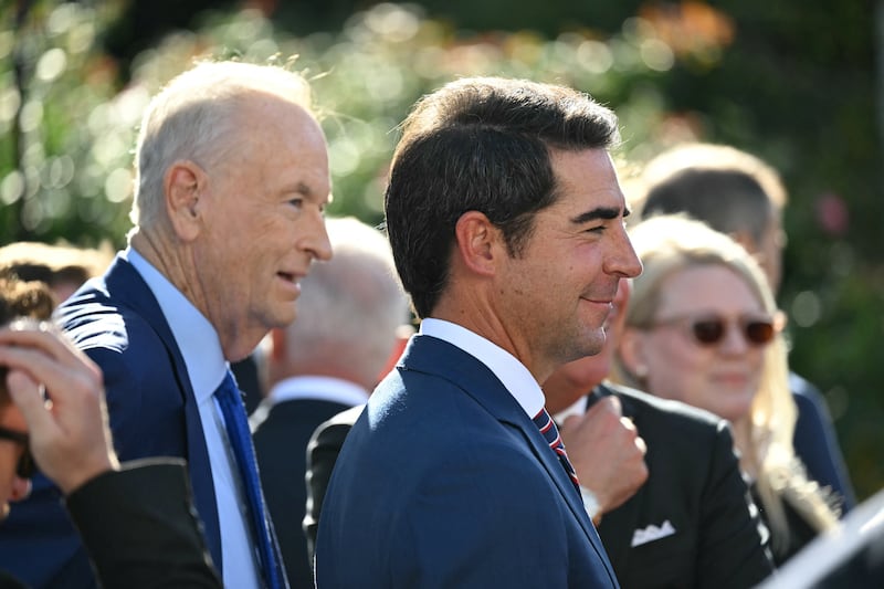 Fox News talk show host Jesse Watters (C) and former Fox pundit Bill O'Reilly (L) attend a Medal of Freedom Ceremony for late US right-wing political activist Charlie Kirk