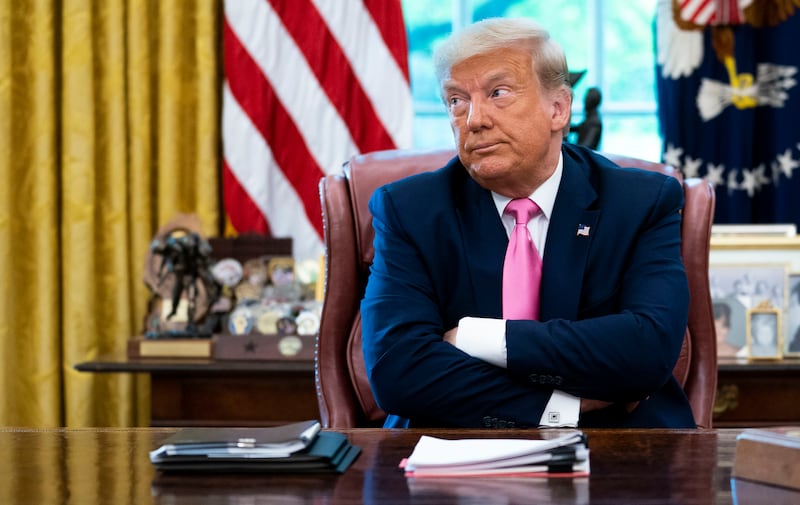 WASHINGTON, DC - JULY 20: U.S. President Donald Trump talks to reporters while hosting Republican Congressional leaders and members of his cabinet in the Oval Office at the White House July 20, 2020 in Washington, DC. Trump and his guests talked about a proposed new round of financial stimulus to help the economy during the ongoing global coronavirus pandemic. (Photo by Doug Mills/Getty Images)