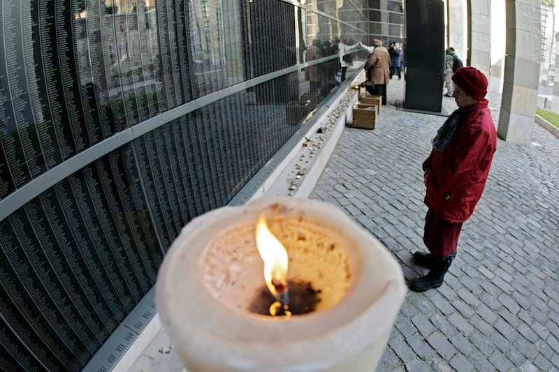 articles/2012/04/17/zionism-denial/holocaust-memorial-candle-openz_lpqklu