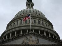 The dome of the U.S. Capitol building is seen on a rainy day as the deadline to avert a government shutdown