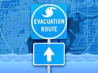 A photo illustration of Tampa Bay and hurricane evacuation sign.