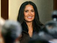 Mexican actress Salma Hayek gestures during a press conference to announce a government incentive scheme for the audiovisual and film industry, in Mexico City, on February 15, 2026. Hayek announced that she is working on a new film aimed at highlighting Mexico's image and responding to the attacks that, she said, have been directed at her country.