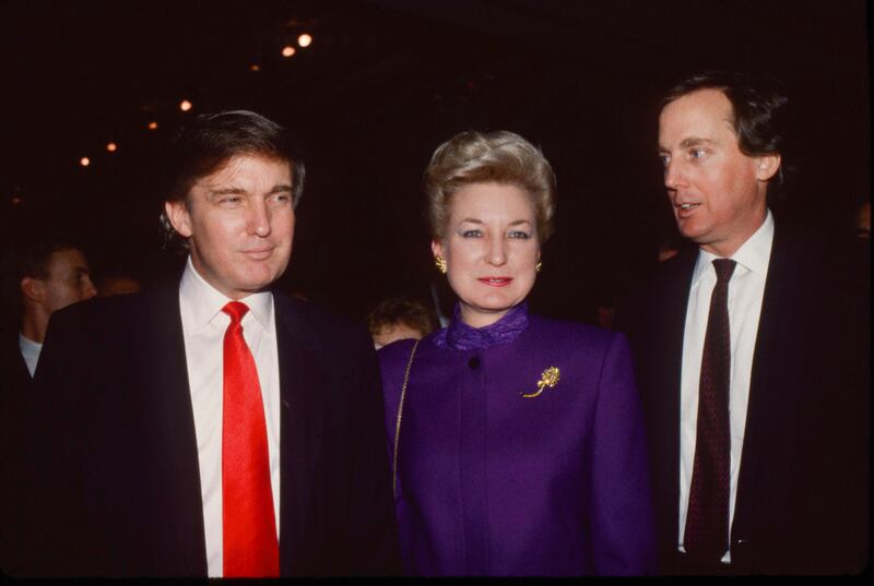 Donald Trump with his sister Maryanne Trump Barry and brother Robert Trump at the Trump Taj Mahal opening in Atlantic City, New Jersey in 1990.