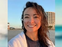 Mica Miller smiles in a selfie on the beach.