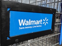 A cart sits outside a Walmart store on Jan. 24, 2023, in Miami, Florida.