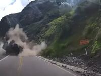 Dashcam shows trucks being totaled by boulders in a rock slide in Peru.