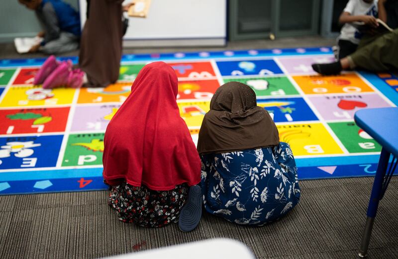 MINNEAPOLIS, MN. - DECEMBER 2025: Children read at ABC Learning Center Inc. in Minneapolis, Minn., on Tuesday, December 30, 2025. A viral video showed a YouTubers knocking on doors of Somali run daycares and claiming there were no children there, accusing the owners of defrauding the state. This daycare was featured in the video but did not allow the Youtuber in to the building. (Photo by Renee Jones Schneider/The Minnesota Star Tribune via Getty Images)