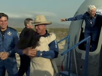2021-07-20T154804Z_1499121661_RC2BOO9TZ966_RTRMADP_3_SPACE-EXPLORATION-BLUEORIGIN_xjmvmx