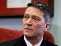 Navy Rear Adm. Ronny Jackson, meets with Senator Jon Tester (D-MT) at his office on Capitol Hill in Washington, U.S., April 17, 2018.