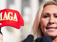 WASHINGTON - MAY 1: Rep. Marjorie Taylor Greene, R-Ga., holds her "Make America Great Again" hat during the news conference outside the U.S. Capitol on Wednesday, May 1, 2024, announcing she will move forward next week on the motion to vacate Speaker Mike Johnson.
