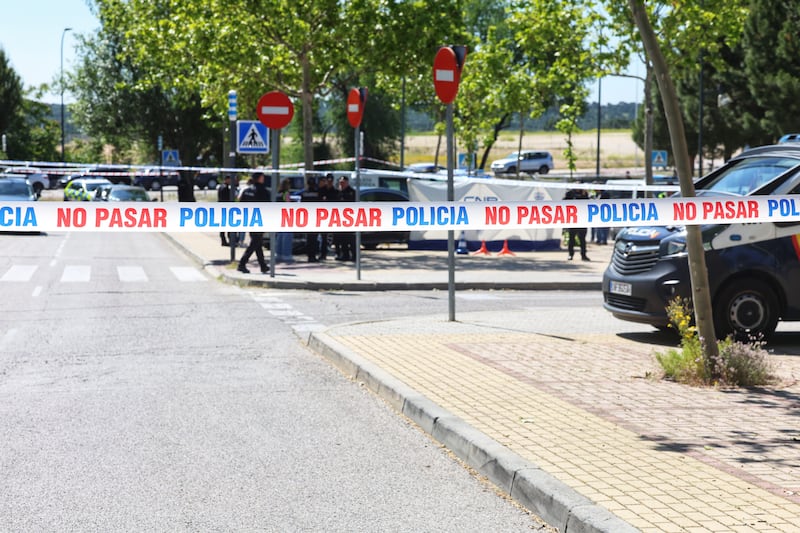 Scientific Police officers at the scene of the incident.