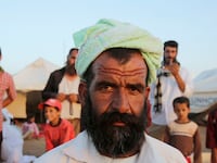 articles/2014/09/28/obama-went-to-war-to-save-them-but-they-can-t-get-u-s-visas/140927-vandentoorn-yazidis-tease_brxcg0