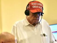 President Donald Trump is shown in a MAGA hat and a Trump golf shirt in a photo posted by the White House, taken at an undisclosed Florida location on Saturday, March 15, 2025.