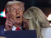 Erika Kirk joins U.S. President Donald Trump onstage during the memorial service for political activist Charlie Kirk at State Farm Stadium on September 21, 2025 in Glendale, Arizona. Kirk, the CEO and co-founder of Turning Point USA, was shot and killed on September 10th while speaking at an event during his "American Comeback Tour" at Utah Valley University. (Photo by Win McNamee/Getty Images)