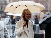 E. Jean Carroll walks outside the Manhattan Federal Court.