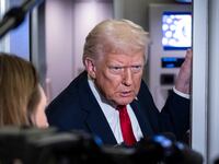 IN FLIGHT - NOVEMBER 25: President Donald Trump speaks to the media aboard Air Force One on November 25, 2025 in flight en route to Florida. The Trumps are traveling to Mar-a-Lago in Palm Beach, Florida for the Thanksgiving holiday. (Photo by Pete Marovich/Getty Images)