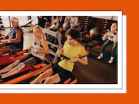 People rowing in an Orangetheory class.
