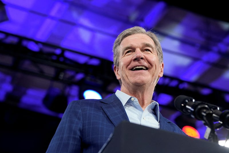 North Carolina Governor Roy Cooper smiles