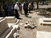 articles/2012/04/10/tolerance-of-whom/muslim-cemetery-tolerance-openz_okhsoi