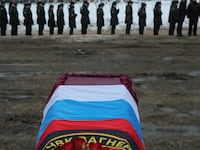 2022-12-24T164315Z_662506851_RC28CY9X3QEQ_RTRMADP_3_UKRAINE-CRISIS-RUSSIA-WAGNER-FUNERAL_bdco64