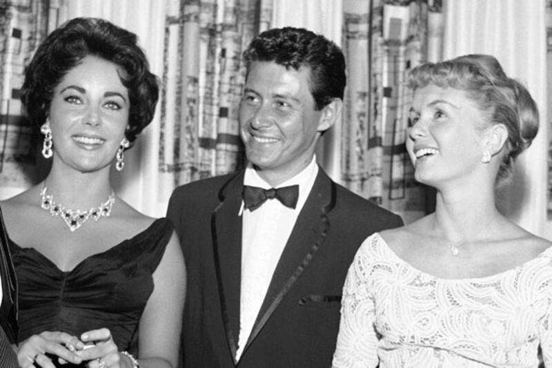 galleries/2012/11/12/when-the-mistress-meets-the-mrs-paula-broadwell-holly-petraeus-more-photos/liz-taylor-mrs-meets-mistress_kzaiyf