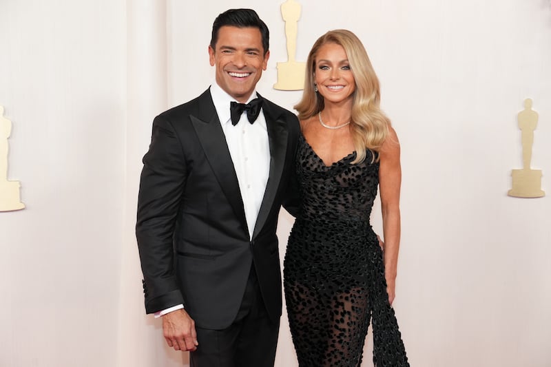 Mark Consuelos and Kelly Ripa attend the 96th Annual Academy Awards at Dolby Theatre on March 10, 2024, in Hollywood, California.