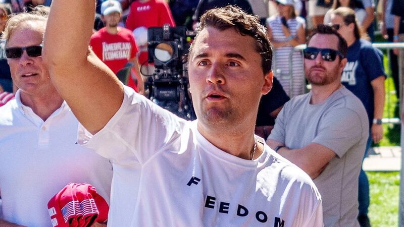 Right-wing activist and commentator Charlie Kirk throws hats to the crowd shortly before he was shot at a Utah Valley University speaking event in Orem, Utah, Sept. 10, 2025.