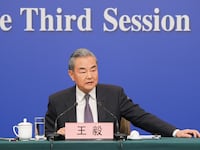 Chinese Foreign Minister Wang Yi attends a press conference.