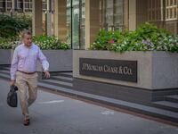 MANHATTAN, NEW YORK, UNITED STATES - 2023/09/14: A person seen walking by the marquee at the main entrance to JPMorgan Chase headquarters building in Manhattan. (Photo by Erik McGregor/LightRocket via Getty Images)