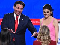 Florida Governor Ron DeSantis (L) and wife Casey DeSantis.