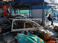 Aftermath of a deadly strike on a marketplace in Donetsk, which its Russian-backed leaders say came from Ukrainian artillery.