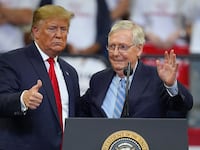U.S. President Donald Trump stands with Senate Majority Leader Mitch McConnell during a campaign rally at the Rupp Arena on November 4, 2019 in Lexington, Kentucky.
