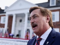 My Pillow CEO Mike Lindell speaks as he waits for former U.S. President Donald Trump, following Trump's arraignment on classified document charges, at Trump National Golf Club, in Bedminster, New Jersey, U.S., June 13, 2023.