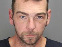 James Robert Crumbley poses in a jail booking photograph taken at the Oakland County Jail in Pontiac, Michigan, U.S. December 3, 2021.