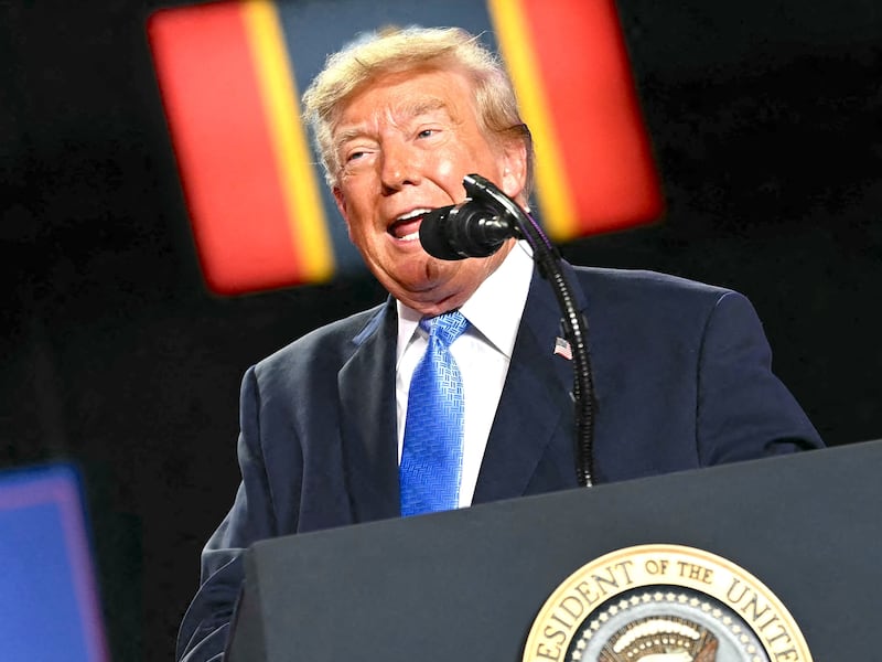 US President Donald Trump speaks at a midterm campaign rally at Crossroads Arena in Corinth, Mississippi on October 26, 2026. President Trump is holding the campaign rally to support the re-election campaign of US Senator Cindy Hyde-Smith (R-MS).
