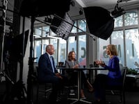 Minnesota Gov. Tim Walz and Vice President Kamala Harris are interviewed by CNN’s Dana Bash at Kim’s Cafe in Savannah, Georgia, on August 29, 2024.
