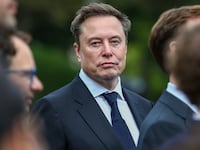Elon Musk attends a press briefing with AI executives, held by Trump following a meeting on artificial intelligence, outside the White House on September 29, 2026.
