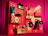 Lovehoney's Couples Advent calendar. It shows 24 days of boxes and different sex toys and accessories like vibrators, cock rings, blindfolds, whips, and lube.