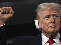 Trump raises his fist to the crowd at the RNC.